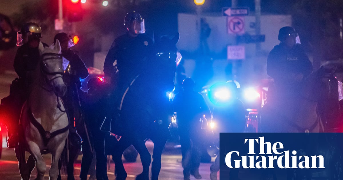 LA police make mass arrests as protesters defy overnight curfew | Los Angeles