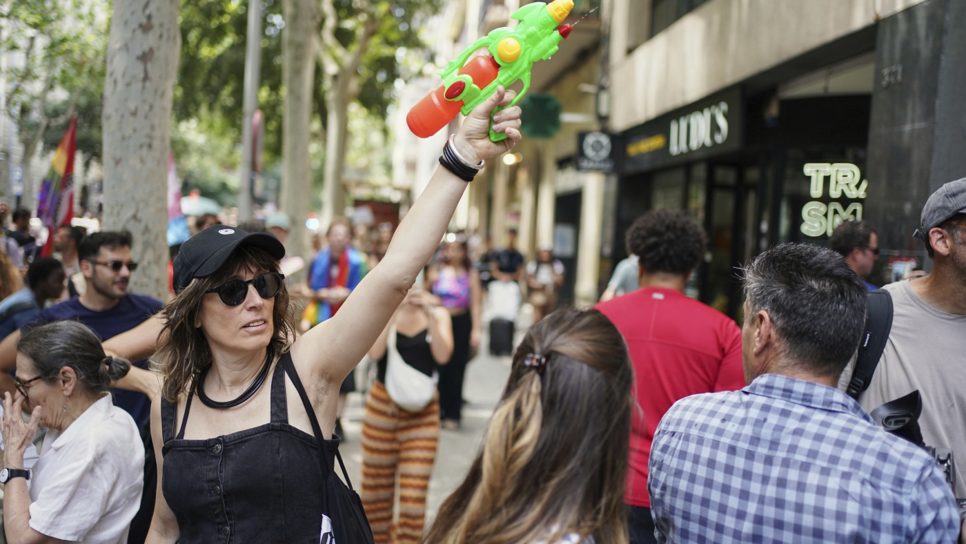 Spaniards turn water pistols on visitors to protest tourism : NPR