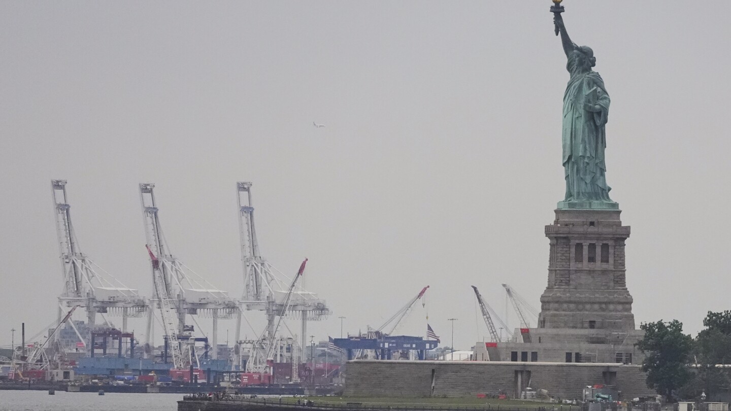 Trump's broad tariffs go into effect just as US economic pain is surfacing