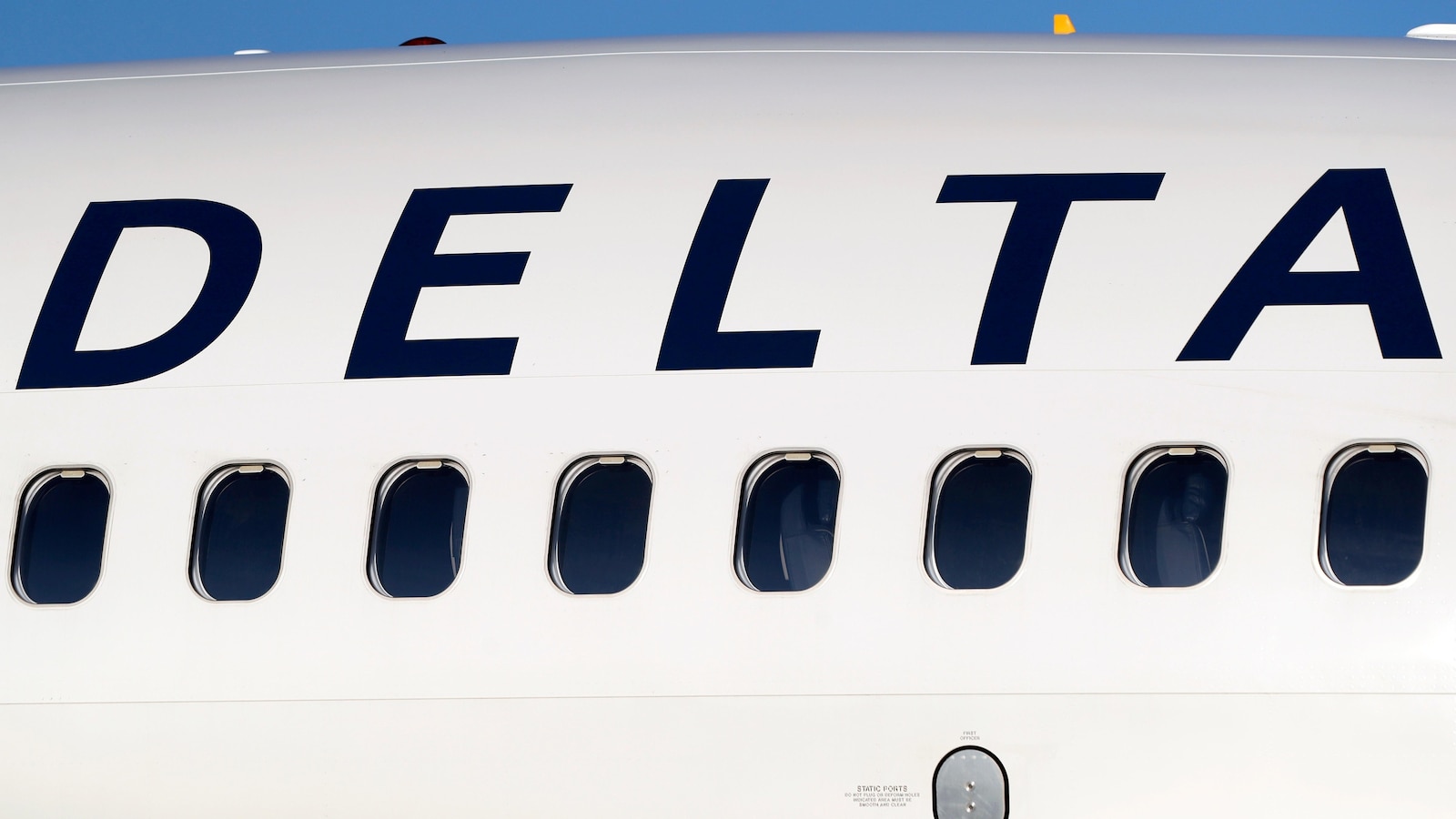 Delta plane wing clips empty aircraft during pushback from gate in Atlanta