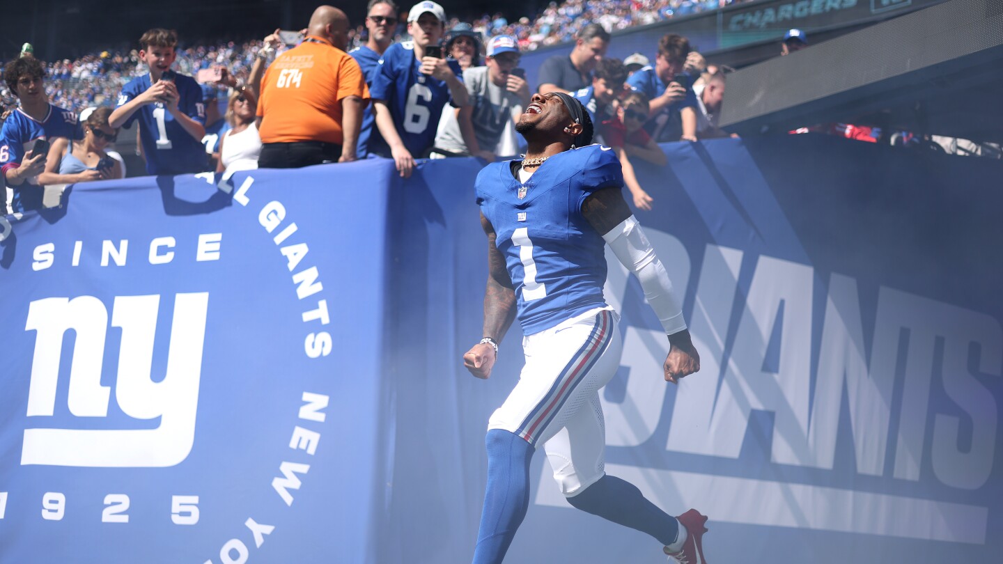 Malik Nabers carted off after hurting knee